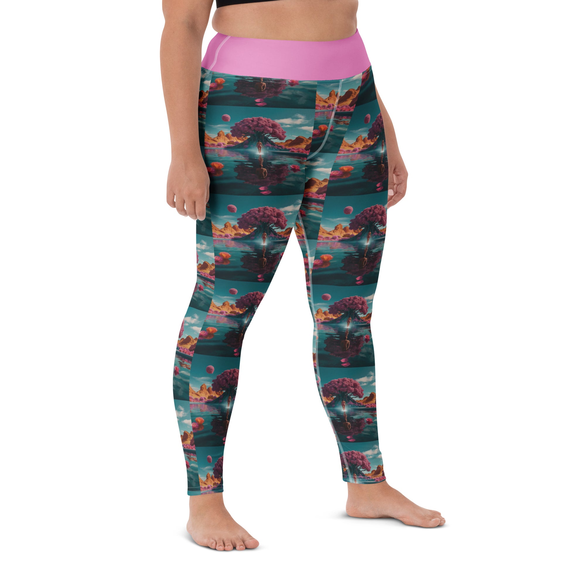 Teal yoga leggings with pink waistband and scenic landscape print, front view