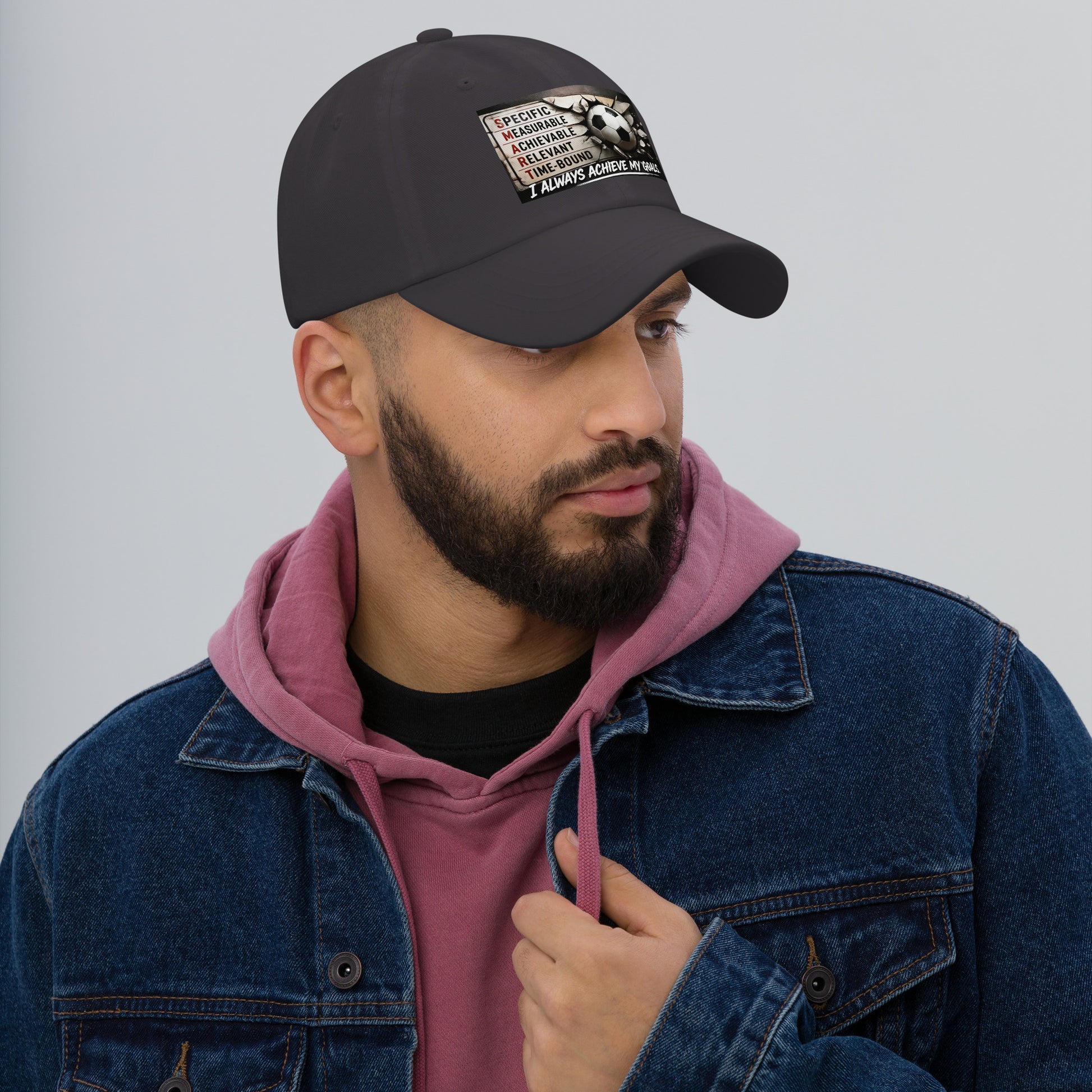 Dark gray dad hat with curved brim and front patch graphic