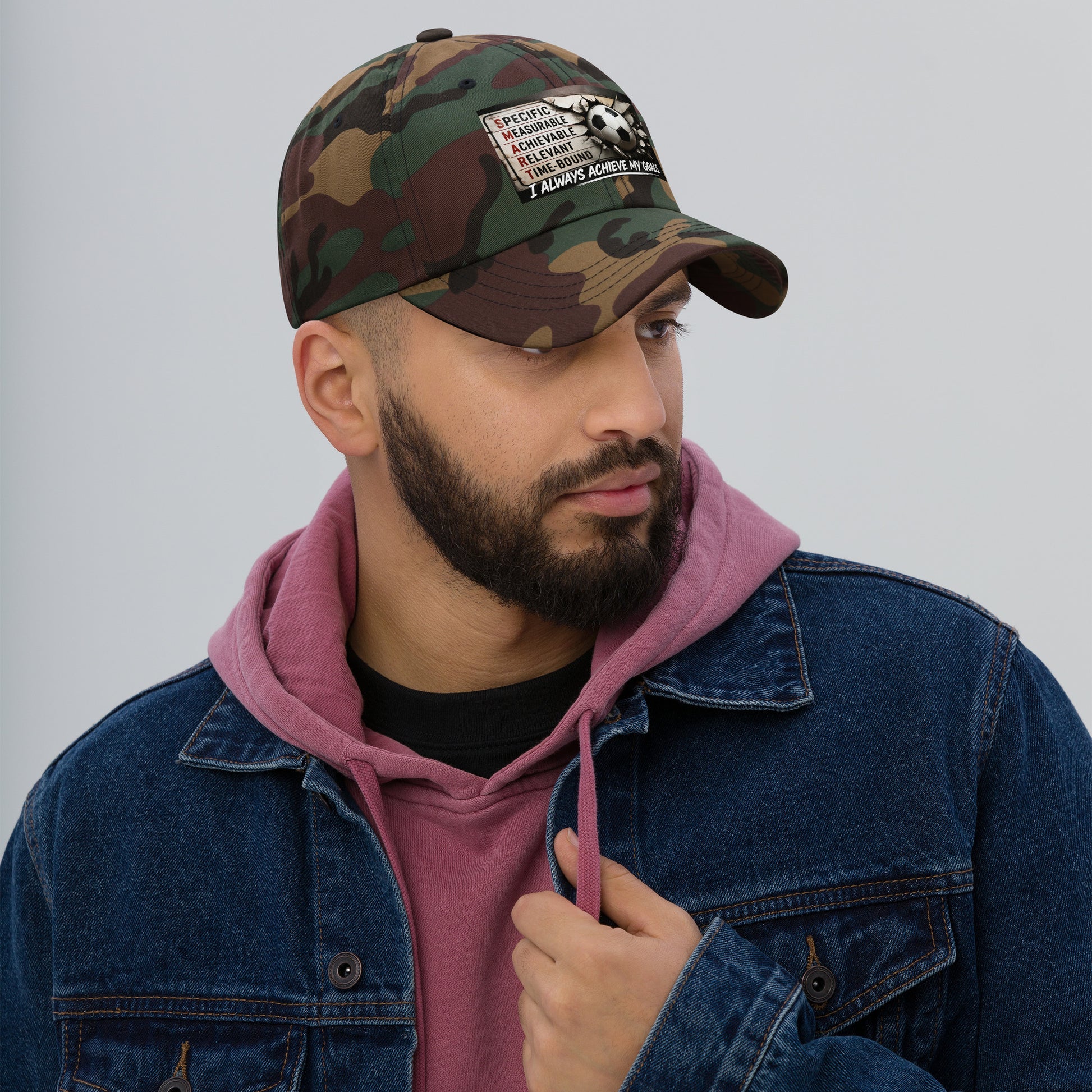 Camo dad hat with stitched front logo patch, curved brim and adjustable strap