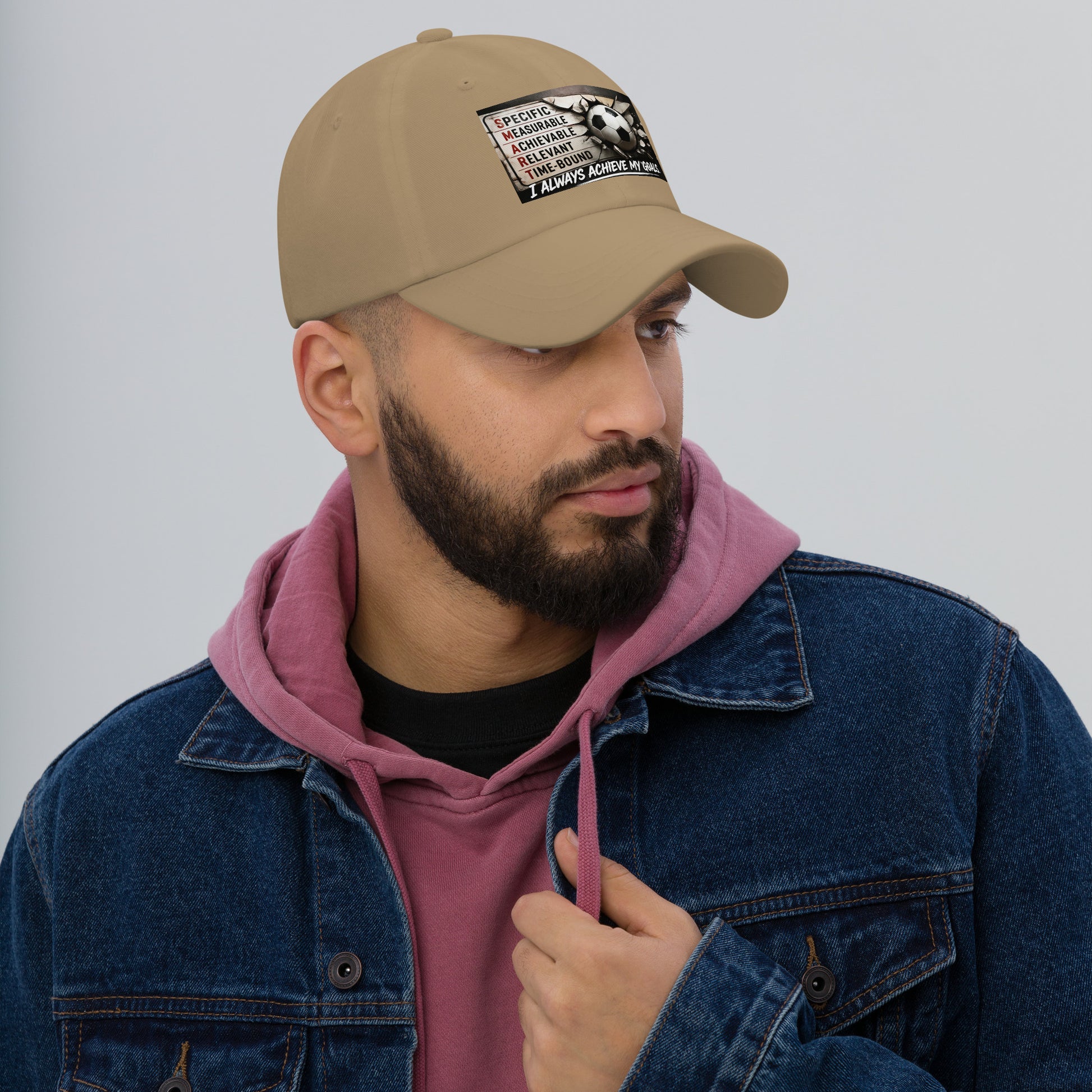 Khaki dad hat with stitched front logo patch, curved brim and adjustable strap