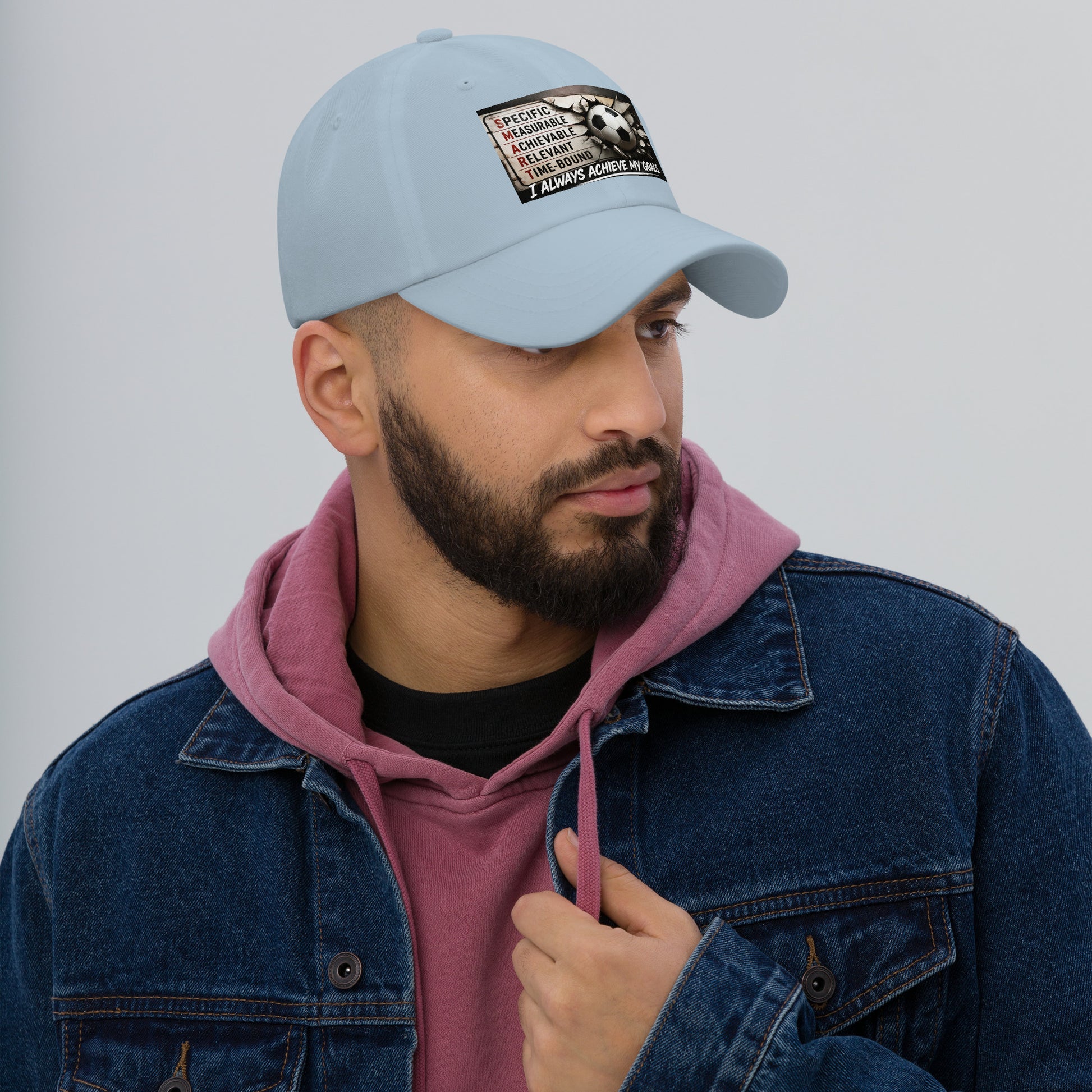 Light blue dad hat with stitched front logo patch, curved brim and adjustable strap