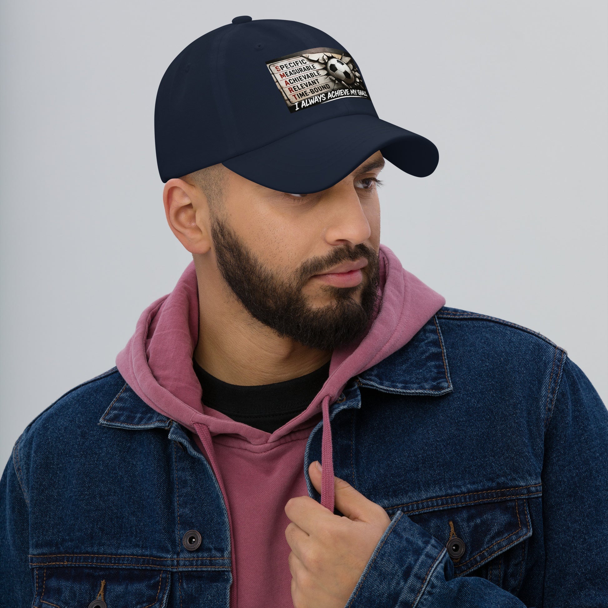 Navy dad hat with stitched front logo patch, curved brim and adjustable strap