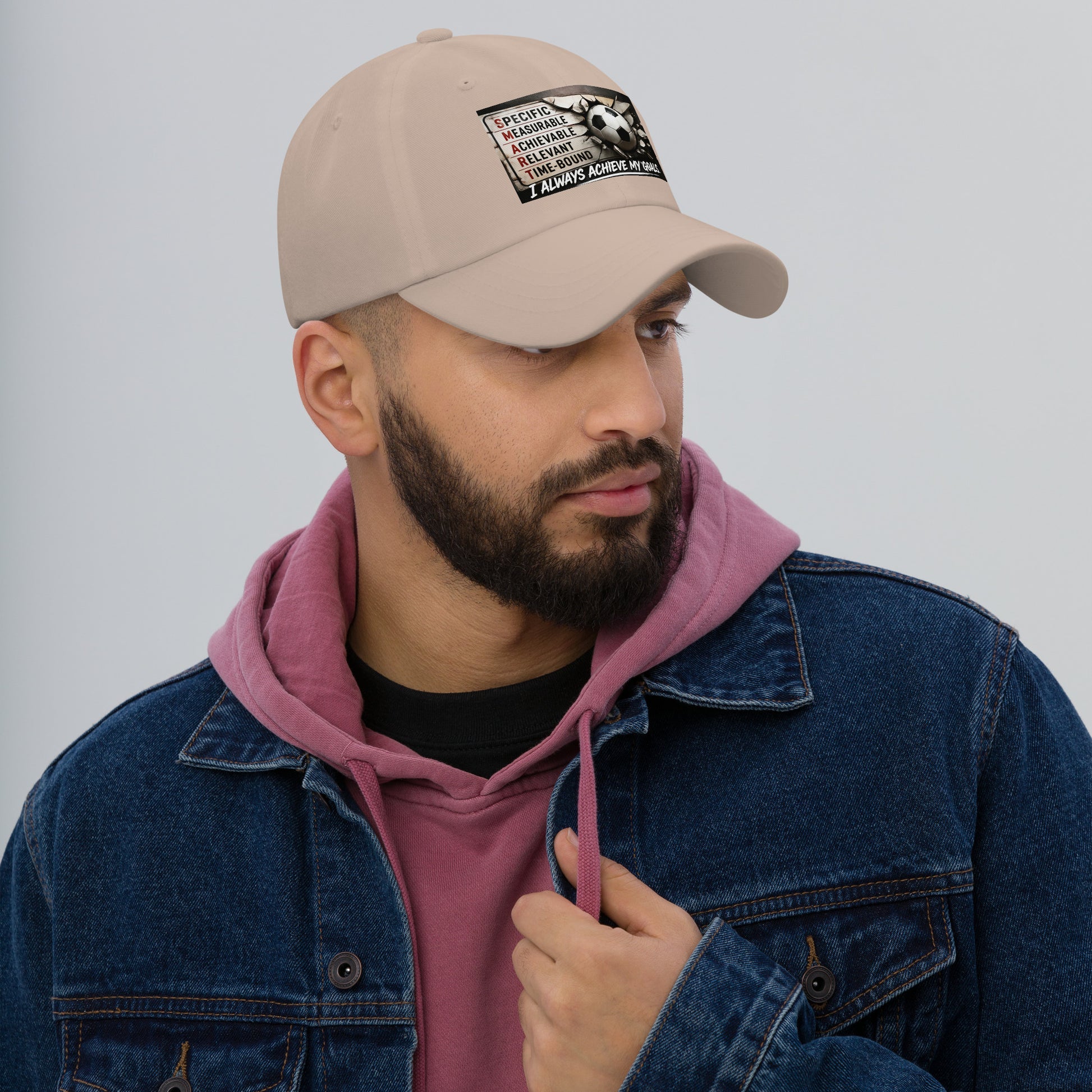 Stone dad hat with stitched front logo patch, curved brim and adjustable strap