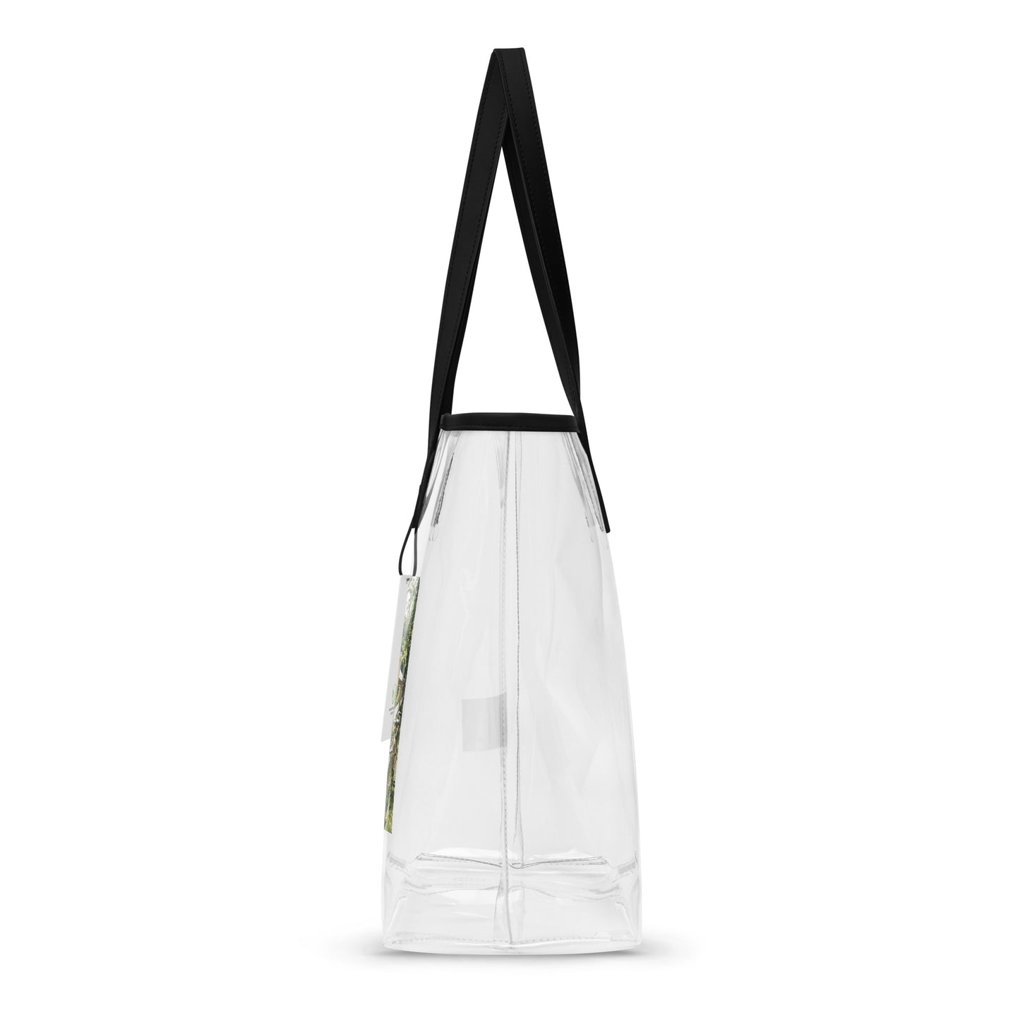 Clear vertical tote bag with black handles, side view showing the printed panel