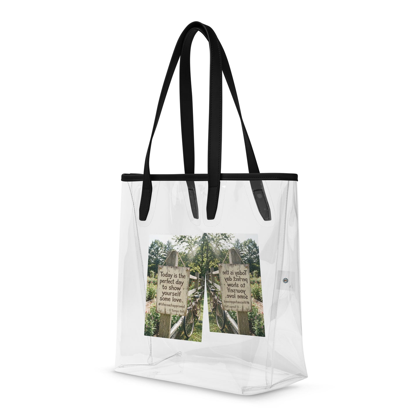 Self Love clear tote bag with black handles and front photo graphic panel