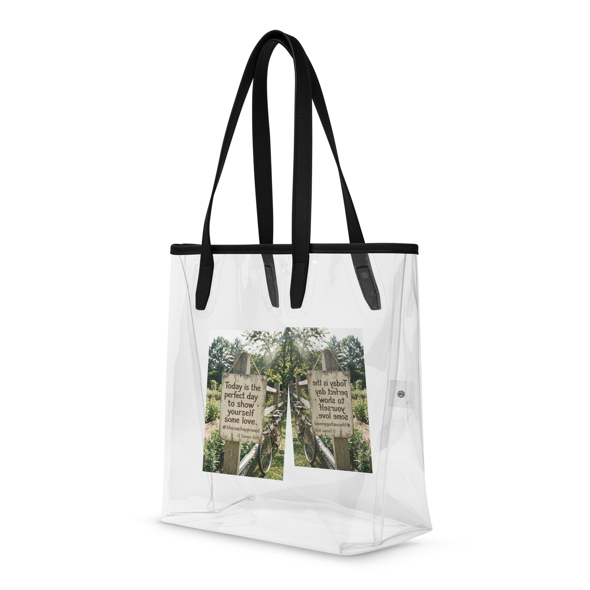 Self Love clear tote bag with black handles and front photo graphic panel