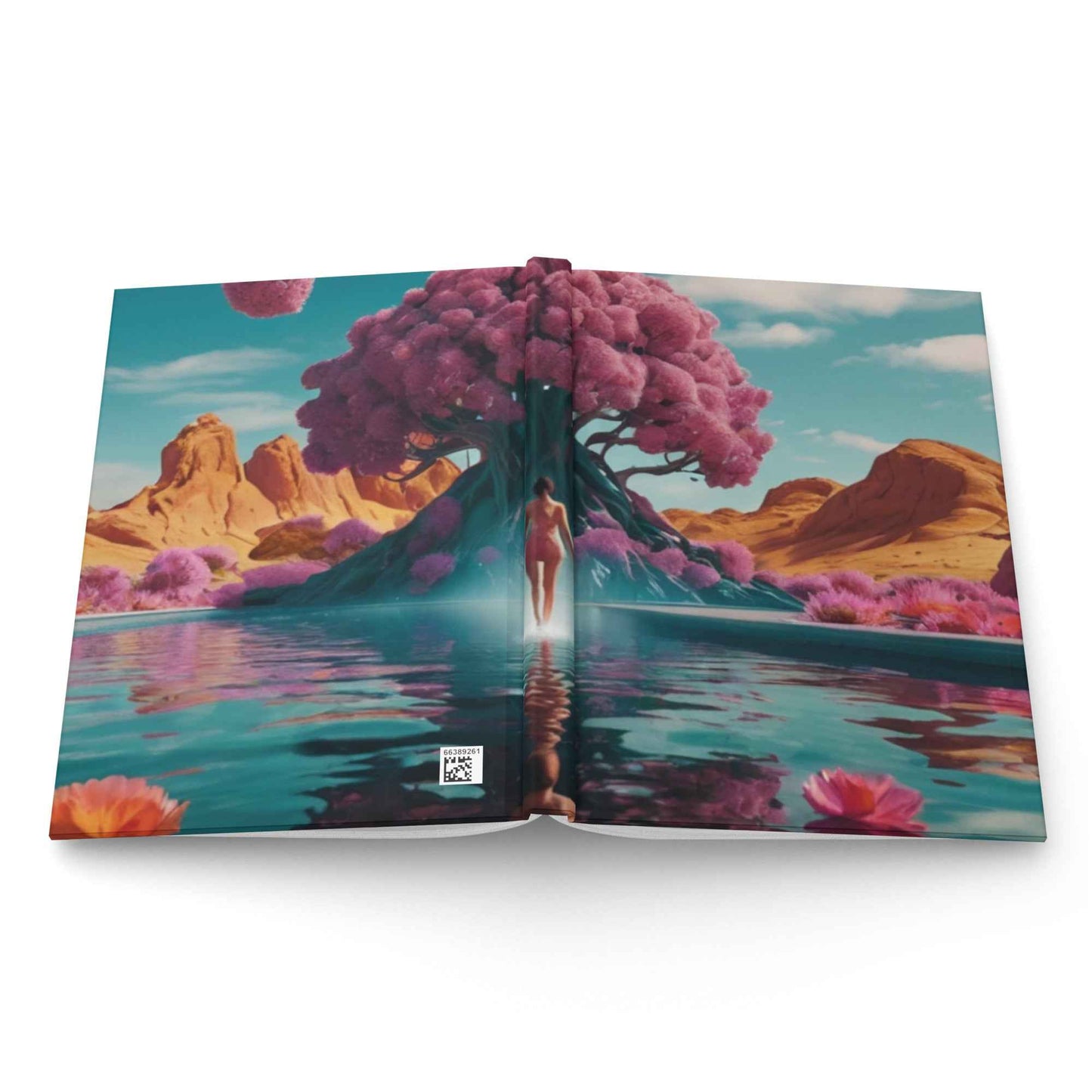 Open matte hardcover journal showing landscape spread with pink tree and reflection