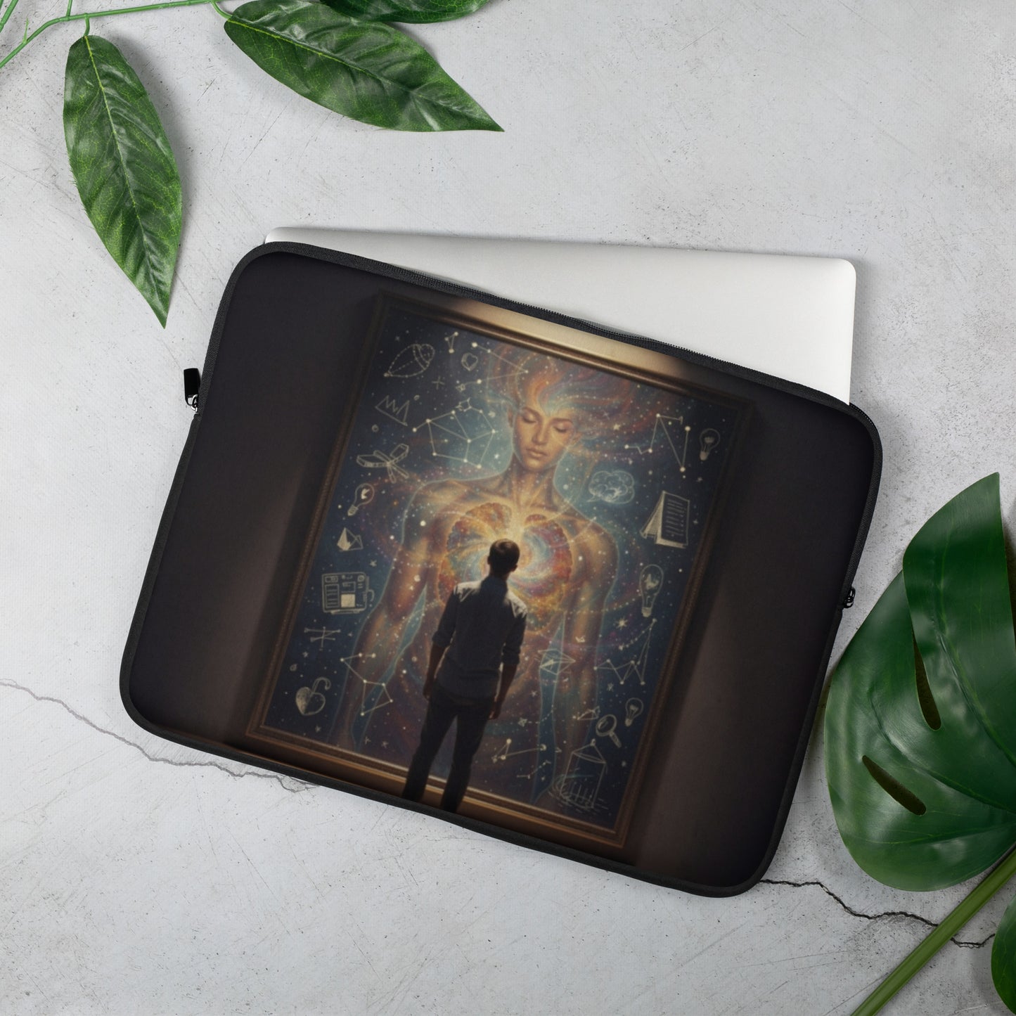 Black laptop sleeve open with celestial artwork and padded interior holding a laptop