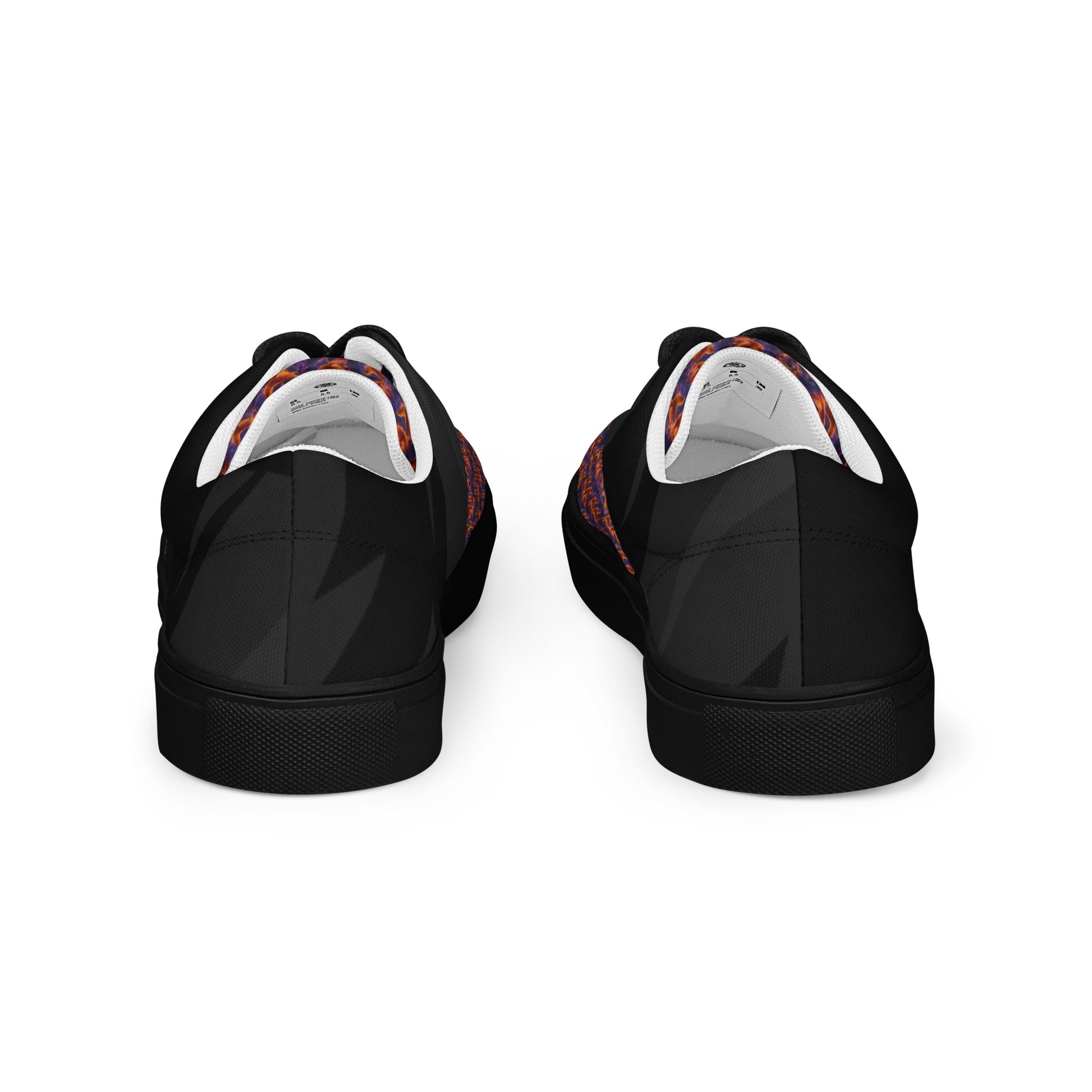 Back view of black lace-up canvas sneakers with textured rubber heel and sole
