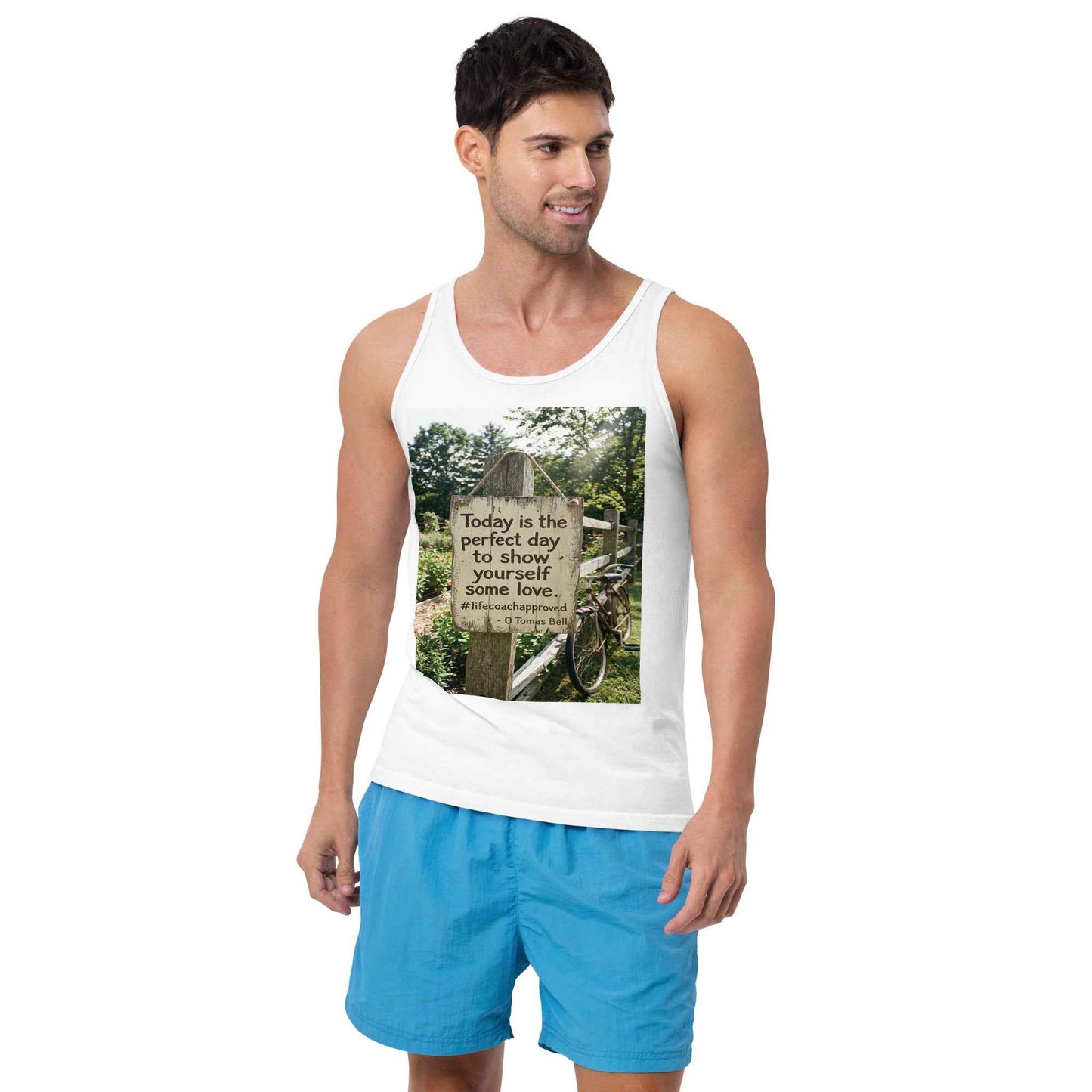 White unisex tank top with scoop neck and front graphic square print, model wearing it.