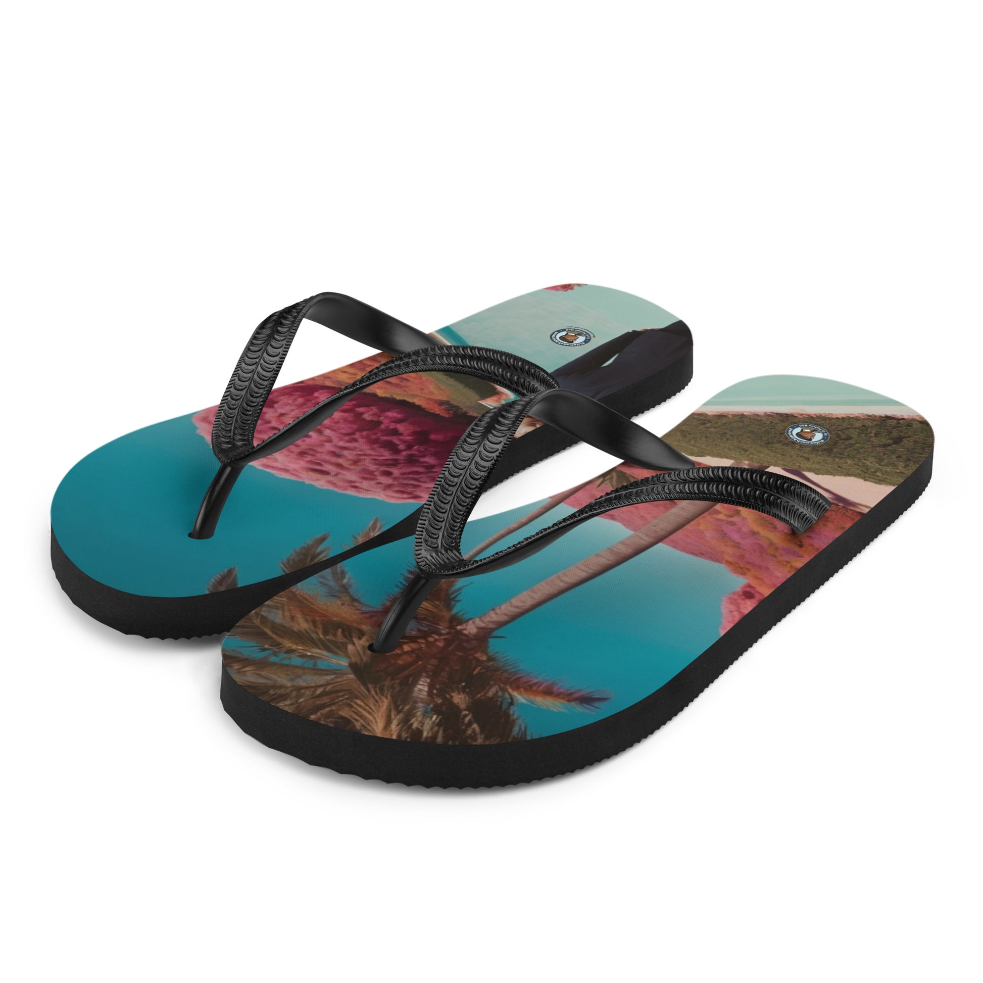 Printed flip-flops with cross-over black straps and cushioned footbeds with small logo