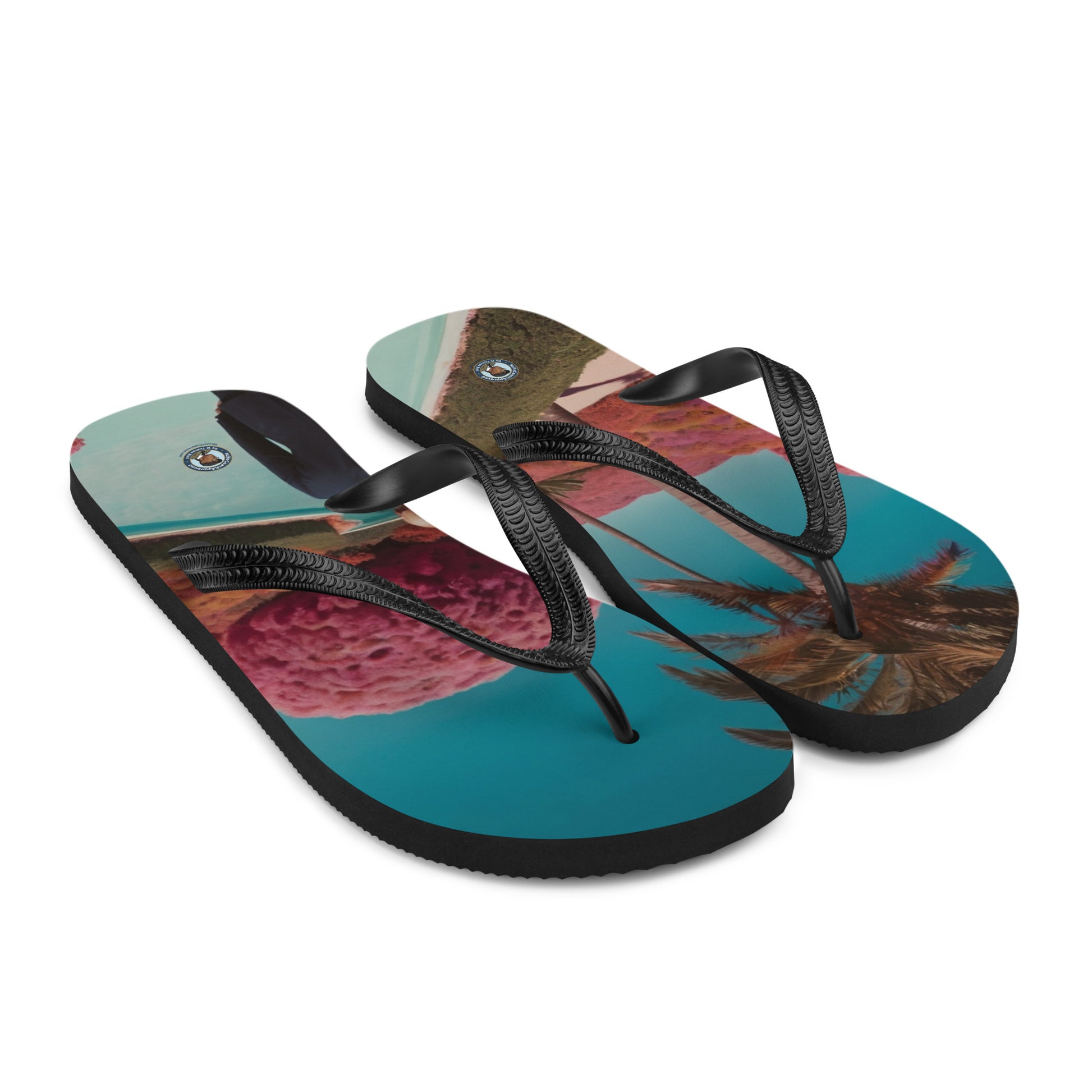 Pair of printed flip-flops with black textured straps and curved cushioned soles