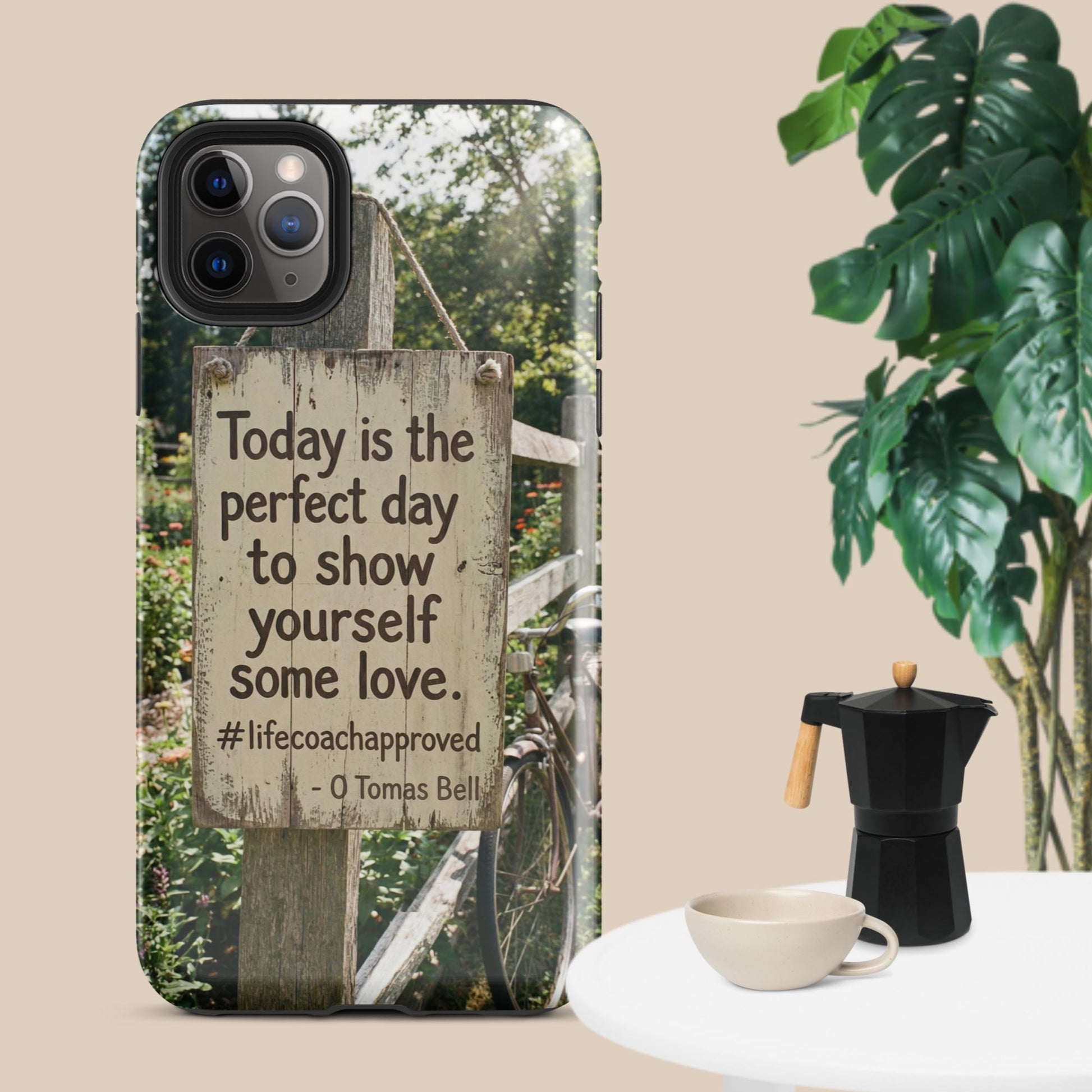 iPhone case with clear back, outdoor fence scene, and quote with #lifecoachapproved