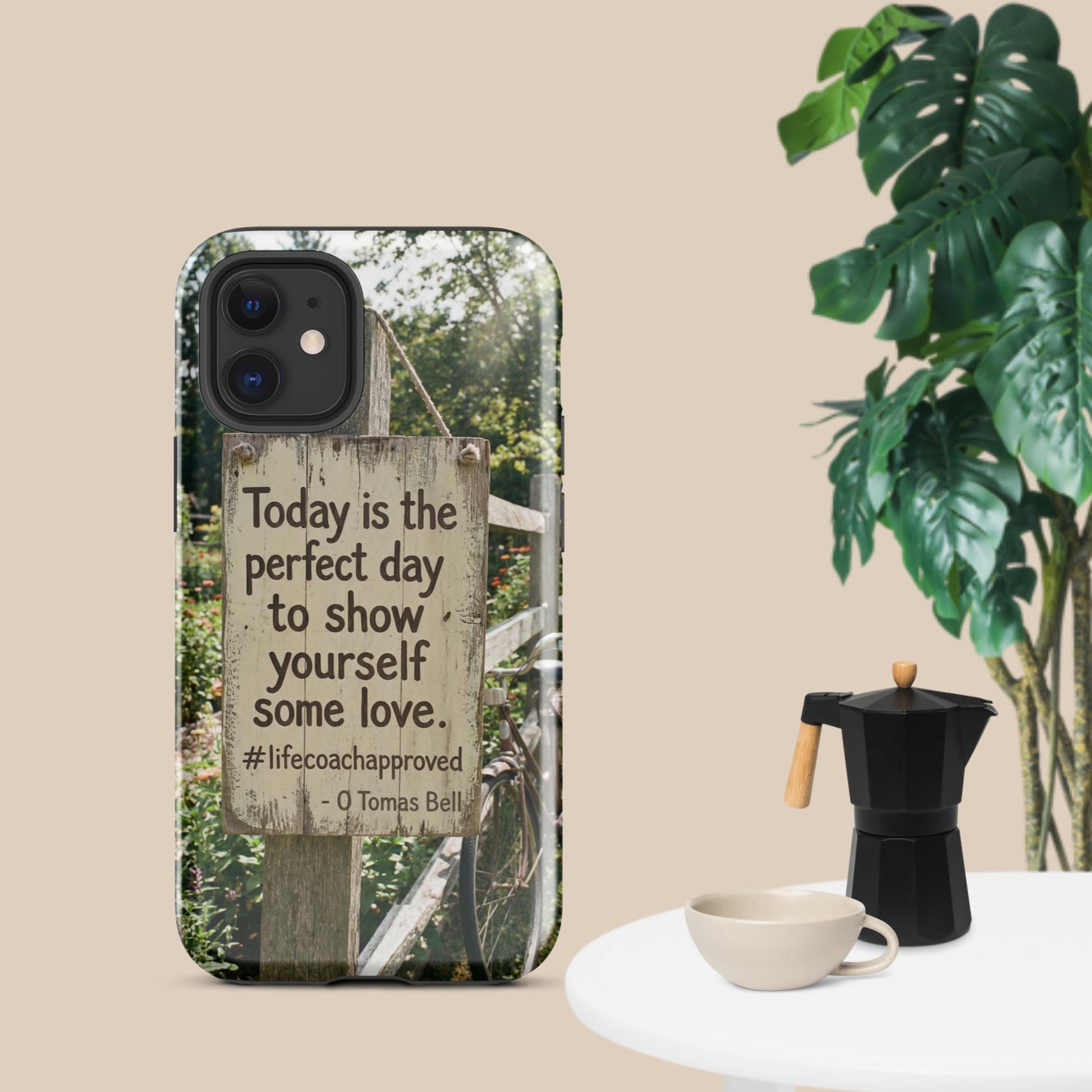 iPhone case with clear back and black camera border, fence print and self-love quote