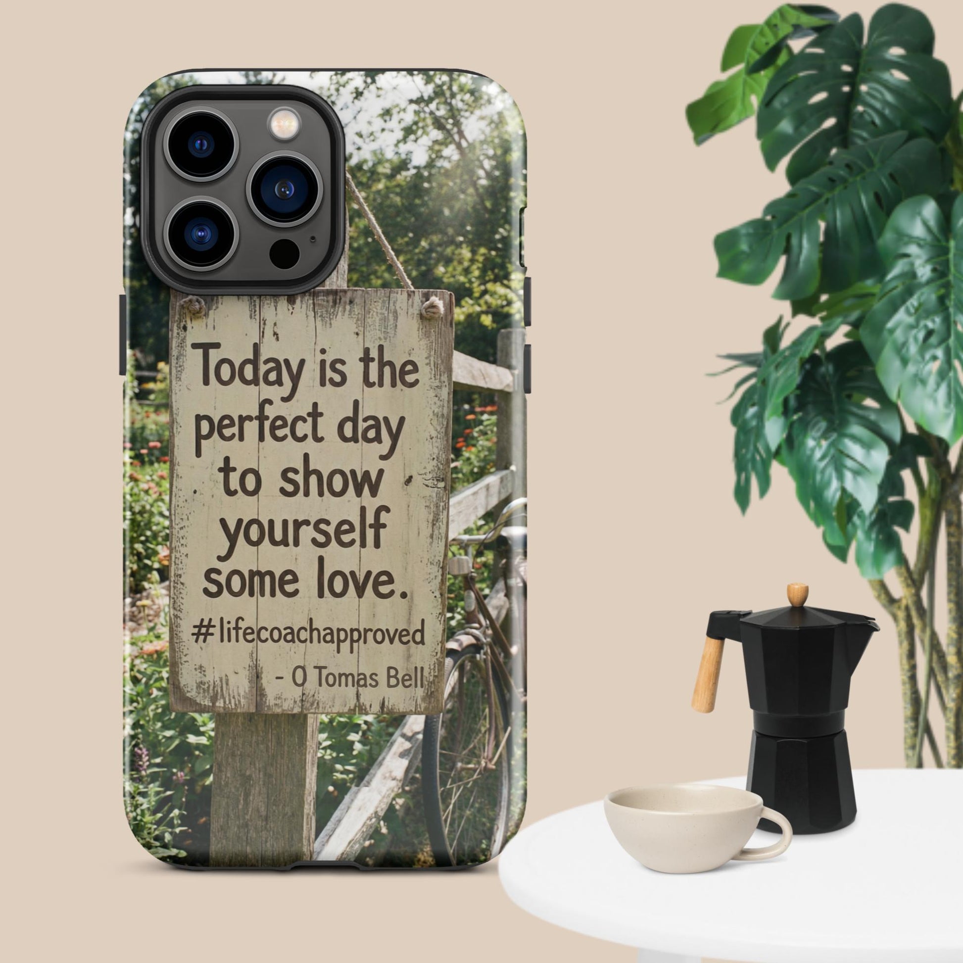 iPhone case with clear back and black frame, outdoor fence print and quote “#lifecoachapproved”