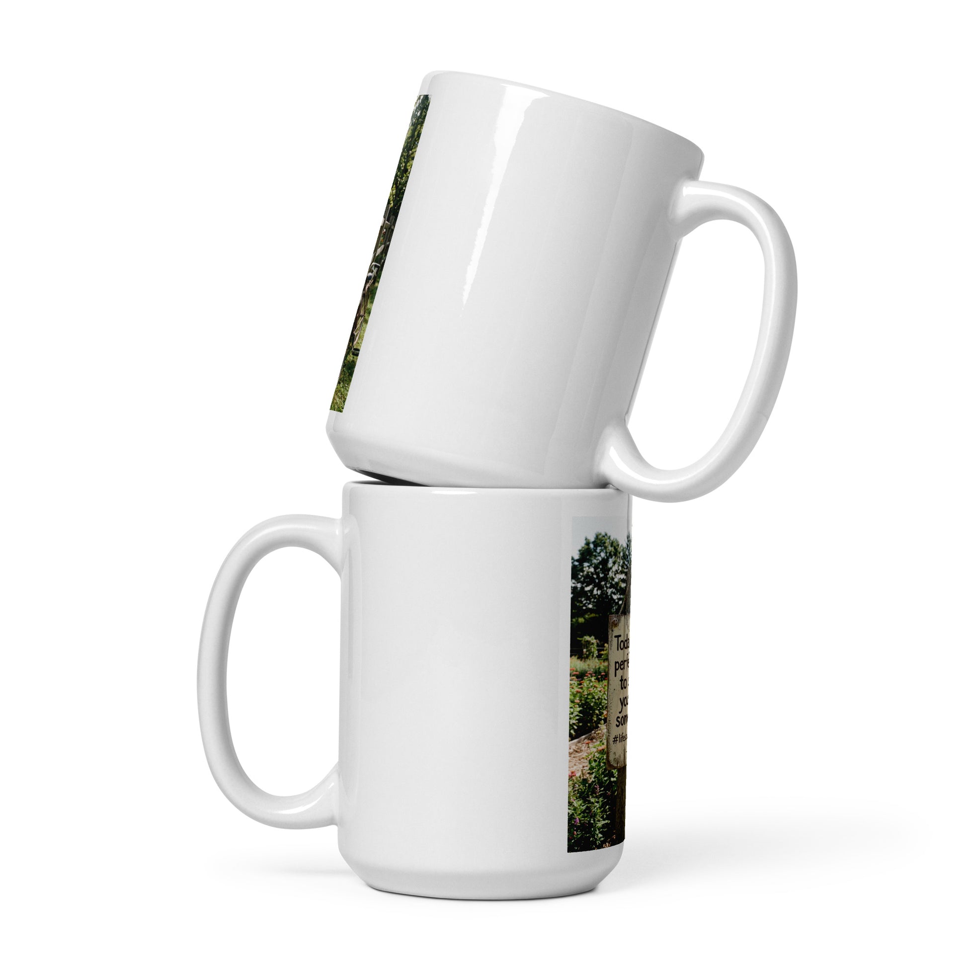 White glossy mug with green vertical print and curved handle, angled view.