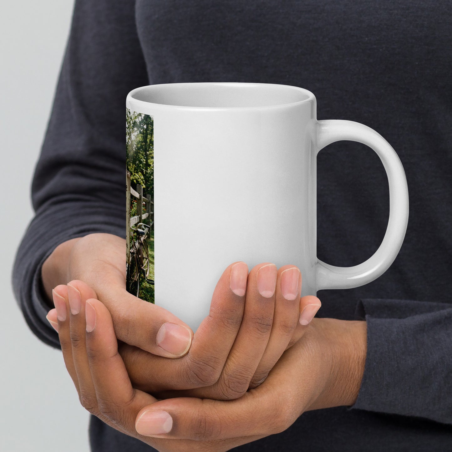White glossy ceramic mug with scenic photo strip on side, rounded handle and rim