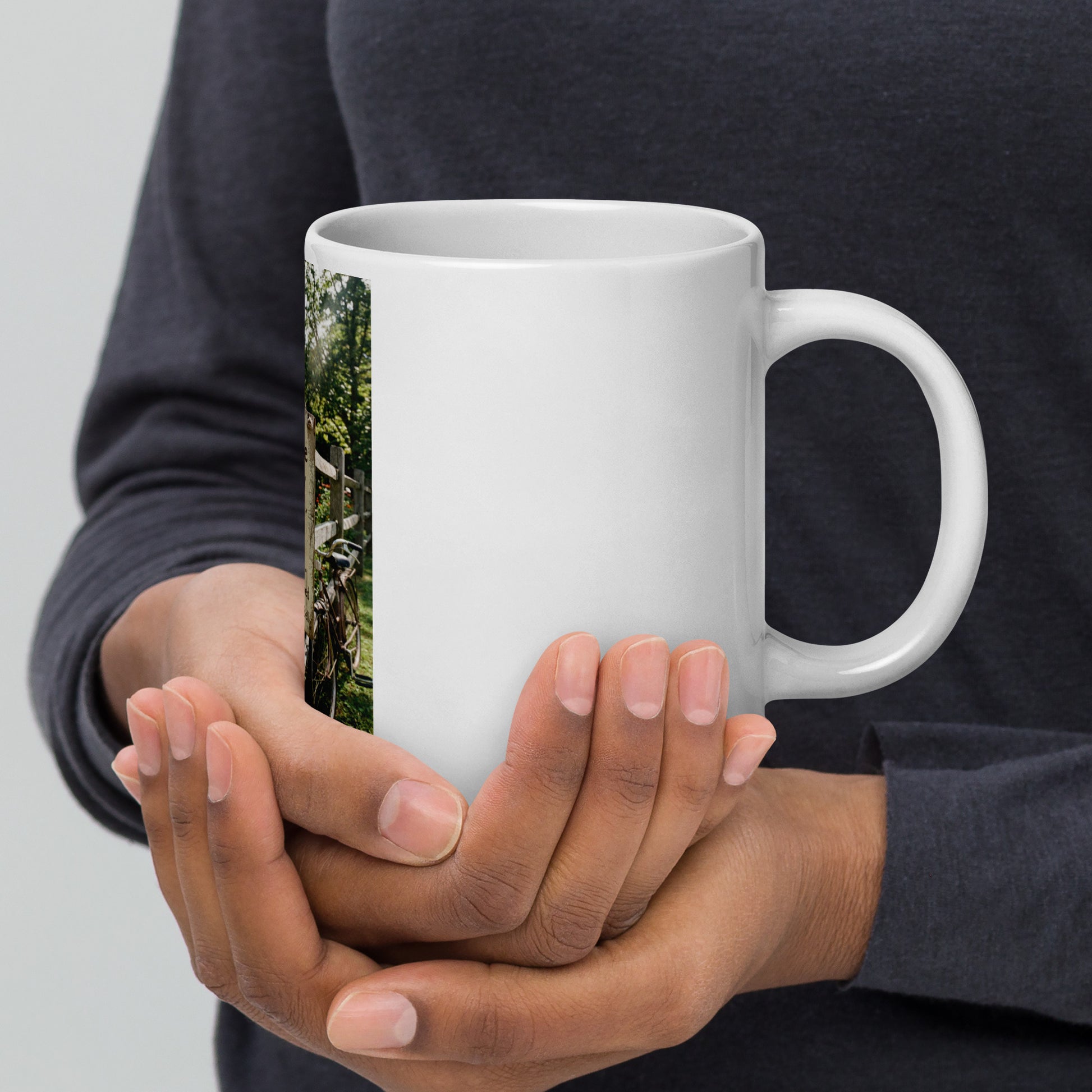 White glossy ceramic mug with scenic photo strip on side, rounded handle and rim