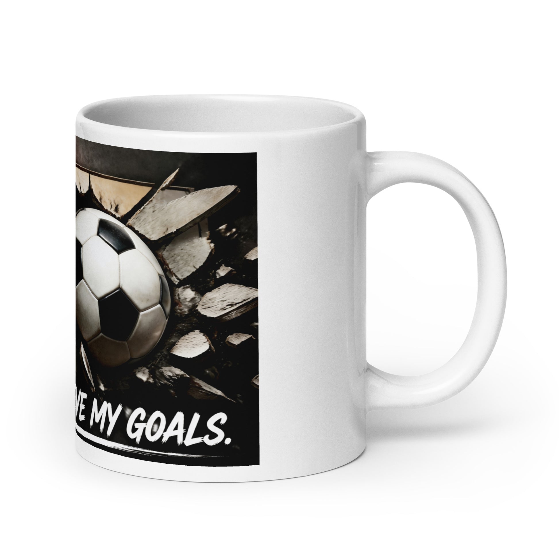 White glossy mug with soccer ball graphic and “I HAVE MY GOALS.” text, close-up