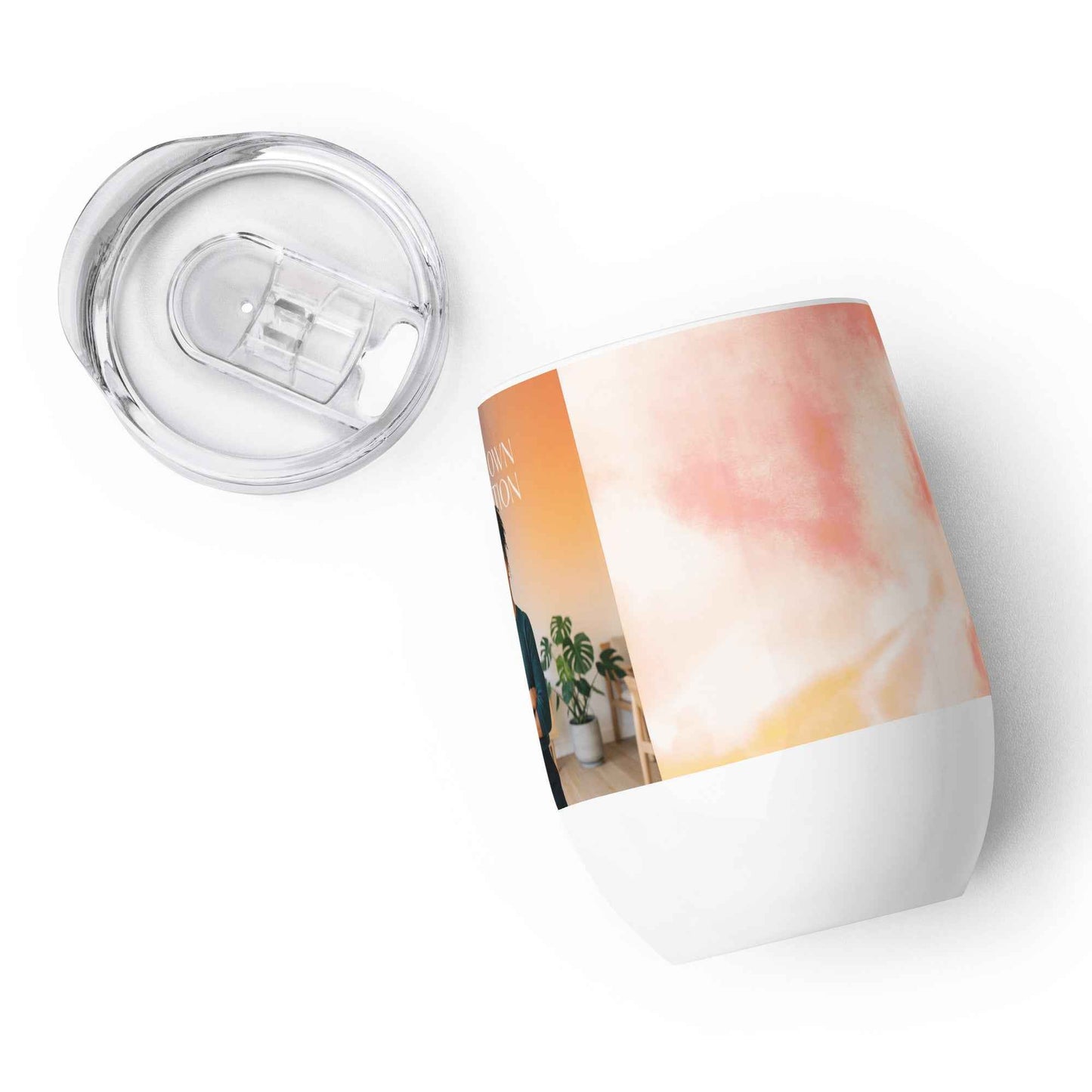 Wine tumbler with clear plastic lid, white base, and side panel of watercolor inspiration design.