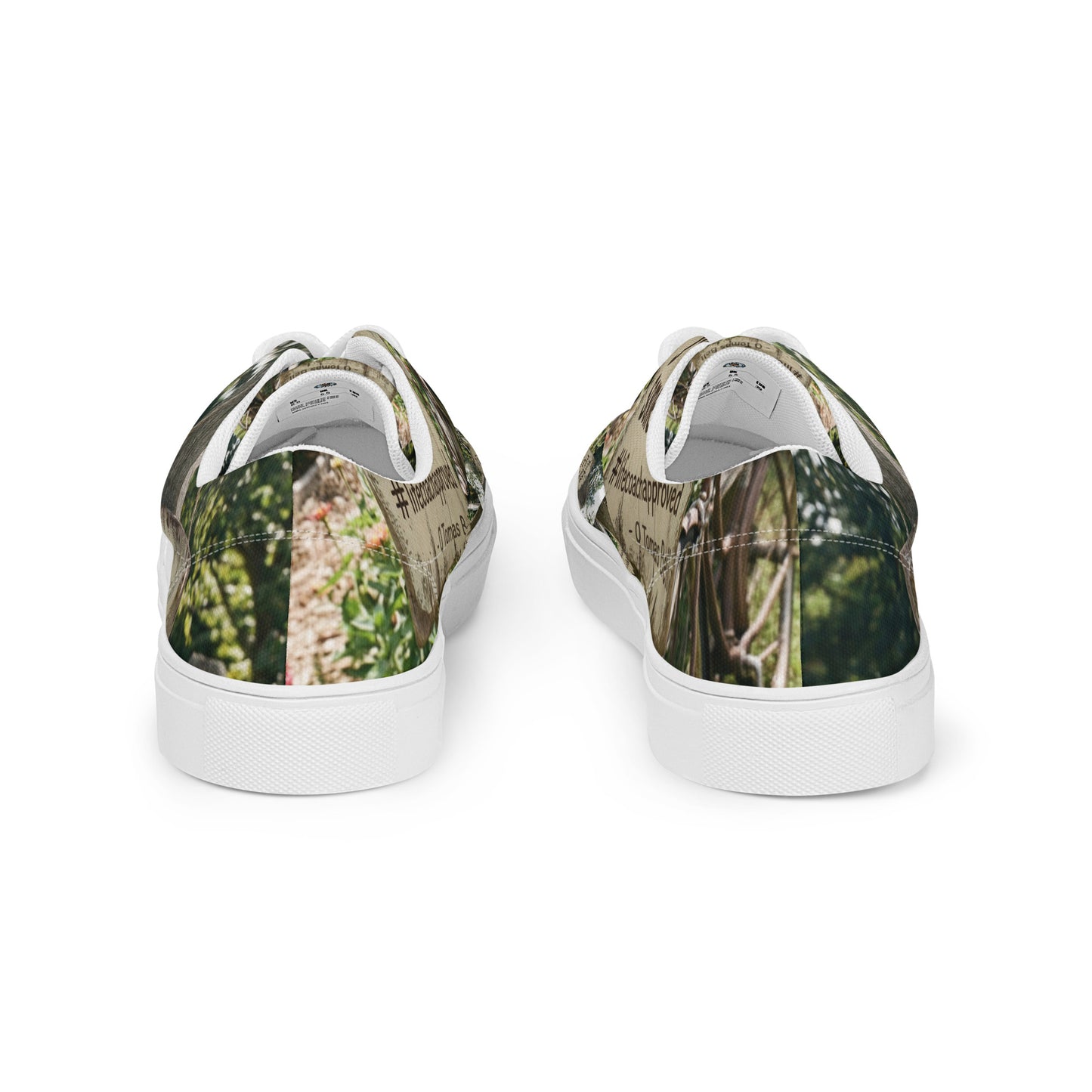 Back view of low-top canvas sneakers with woodland print and white rubber heel cup.