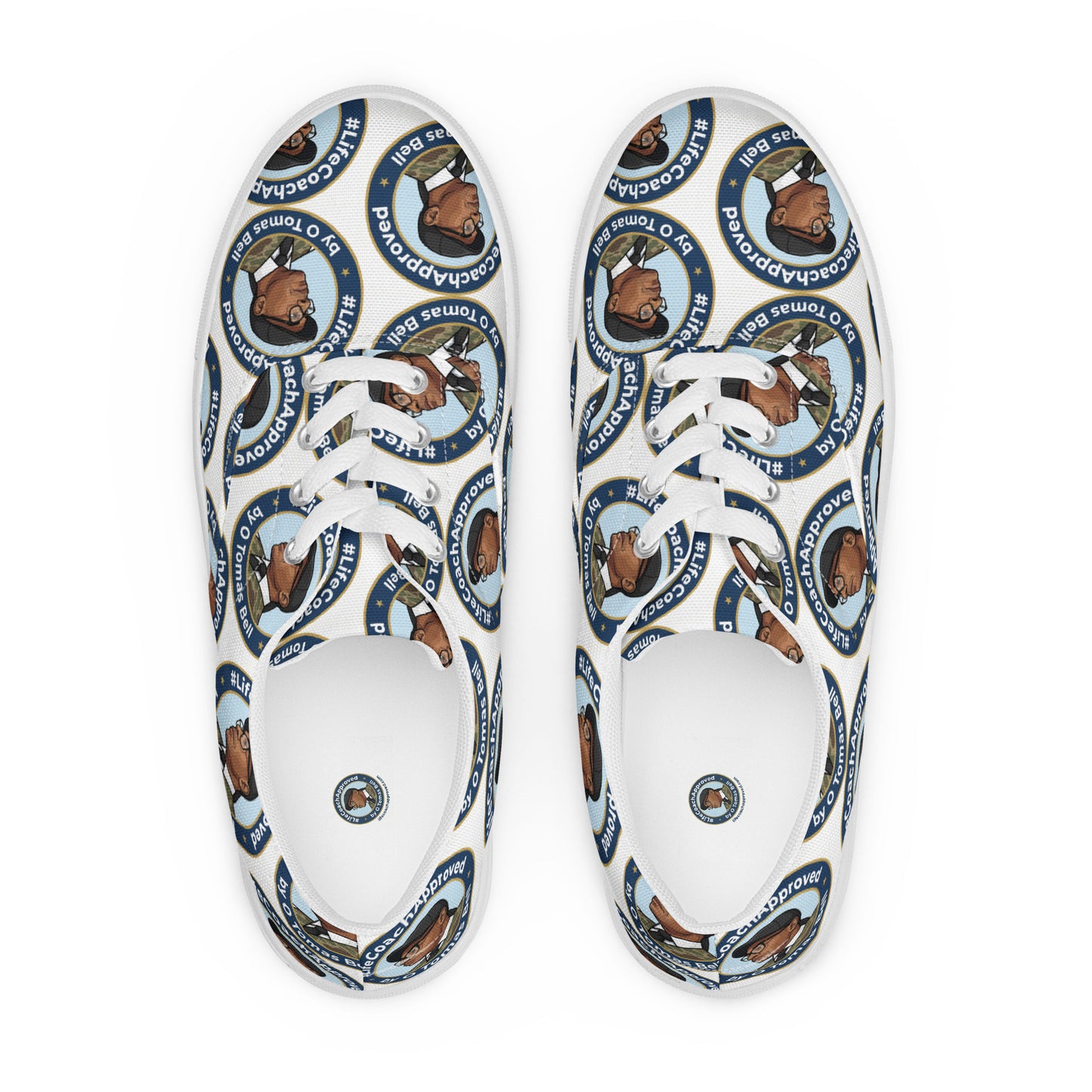 Lace-up canvas sneaker pair with blue-and-brown cartoon bear print and black sole