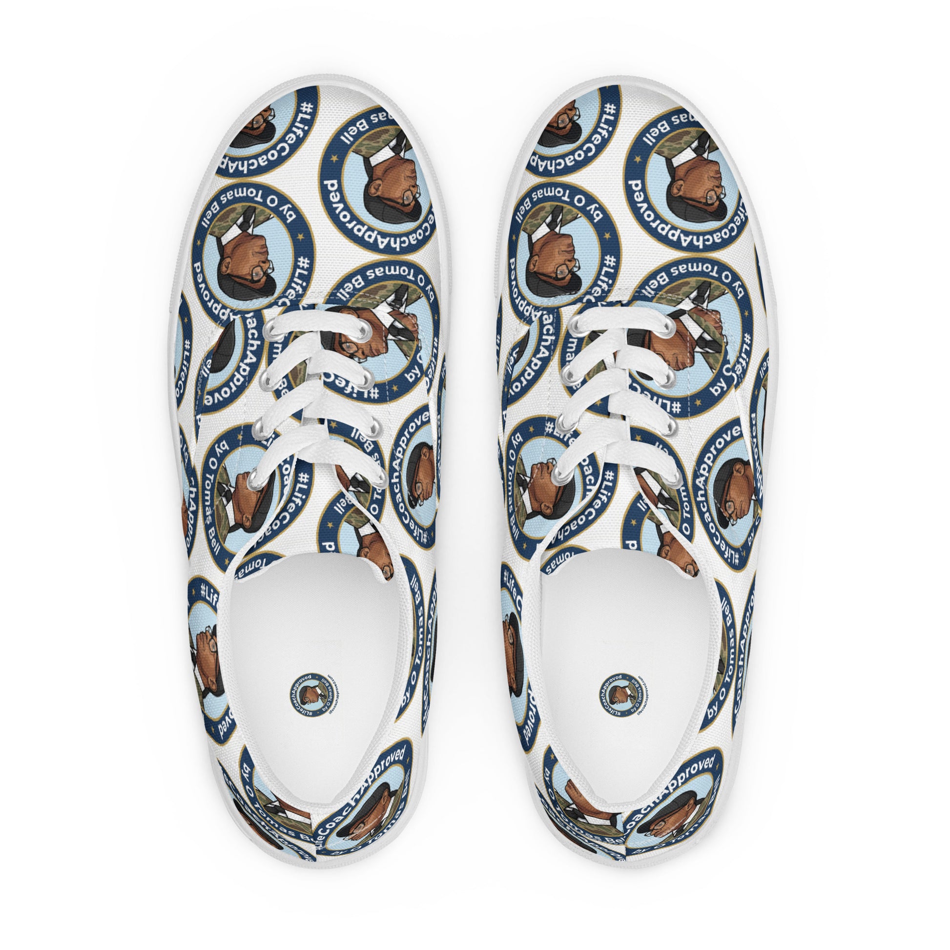 Lace-up canvas sneaker pair with blue-and-brown cartoon bear print and black sole