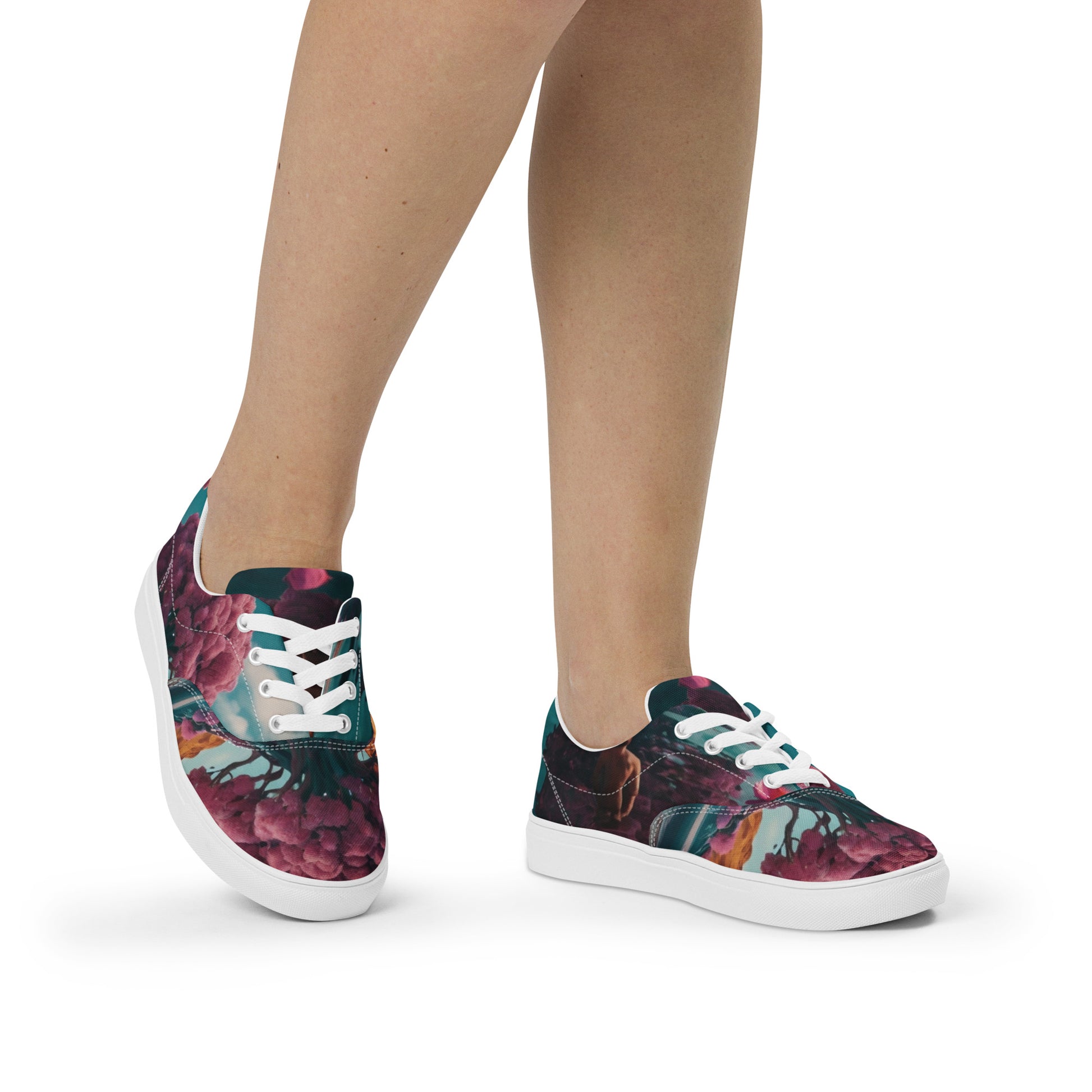 Lace-up canvas sneakers in floral print, side view with white laces and white rubber sole