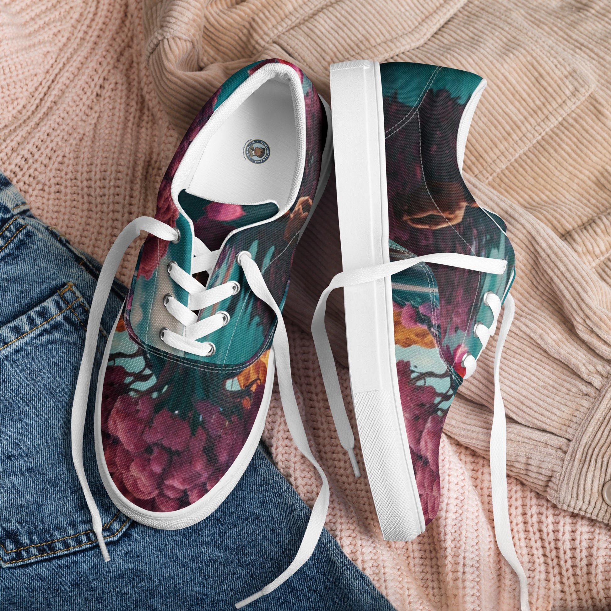 Canvas lace-up sneakers with maroon and teal floral print, white laces and thick sole