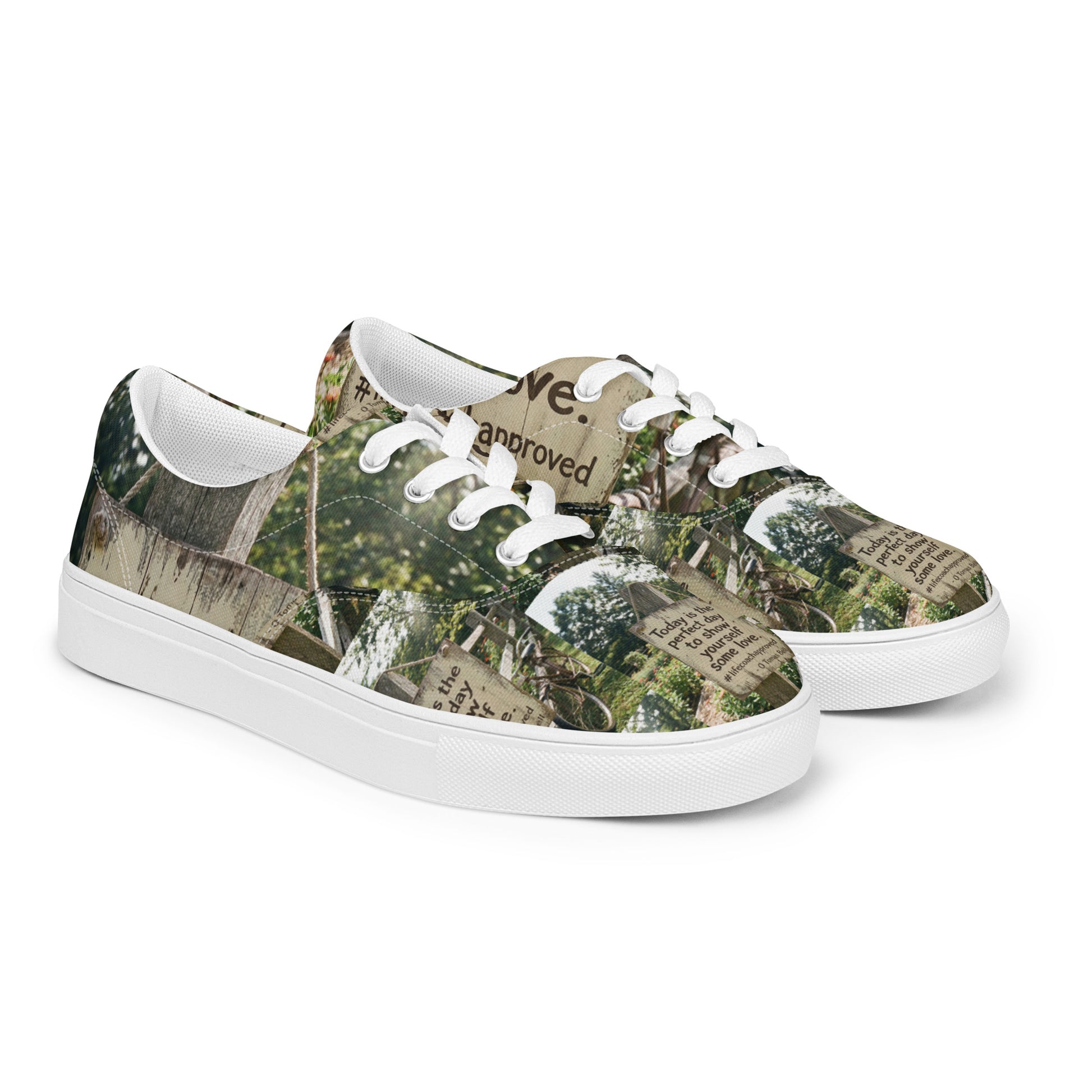 Low-top lace-up canvas shoes with woodland print upper and white rubber outsole.