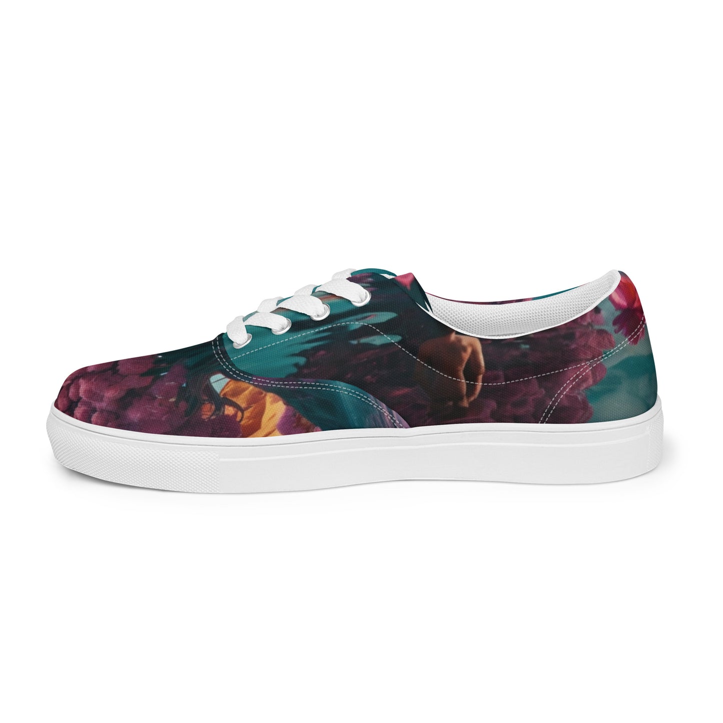 Lace-up canvas sneakers, front profile with floral upper and white toe bumper