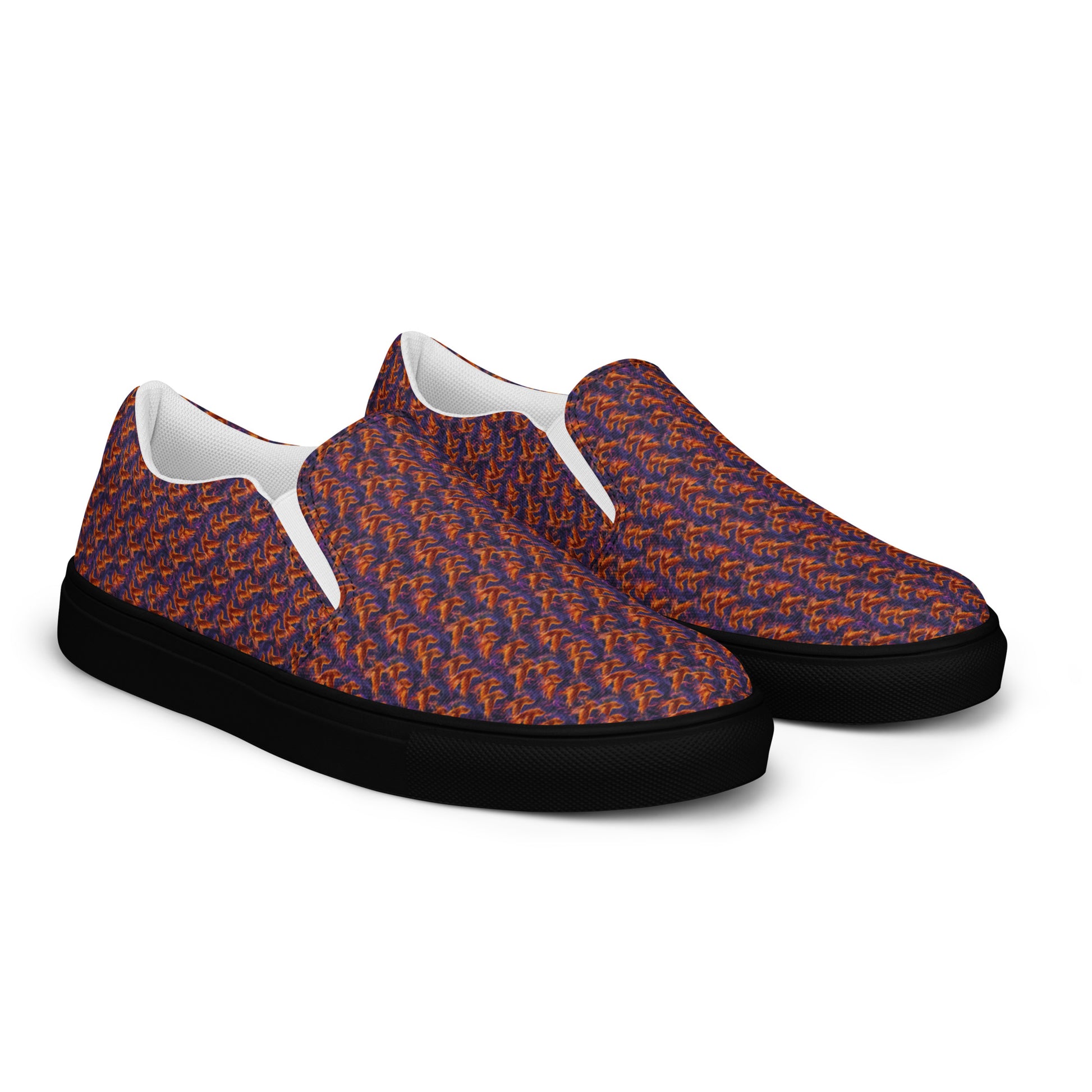 Women’s slip-on canvas shoes, orange-and-blue patterned upper, black rubber sole